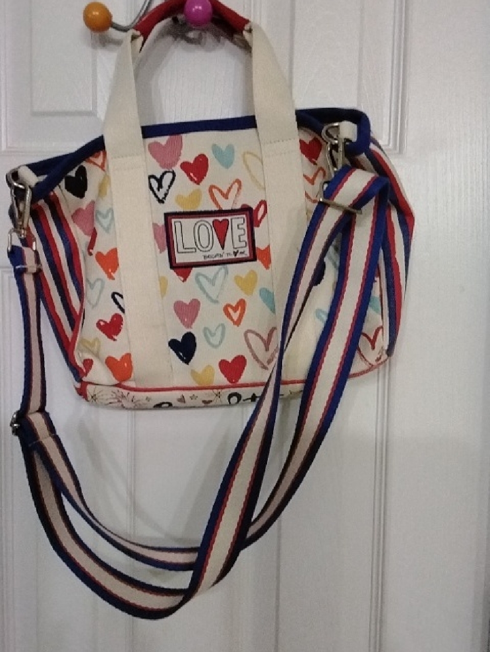 Brighton Heart Shapes Crossbody with Navy and Pink Striped Strap